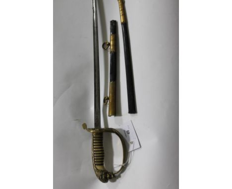 A GERMAN NAVAL OFFICERS SWORD. An Imperial German period naval officers sword, complete with its scabbard. (in two pieces). T