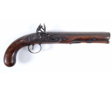 A FLINTLOCK HOLSTER PISTOL. Both action with indistinct makers name, and mounts are of steel construction. Having an octagona