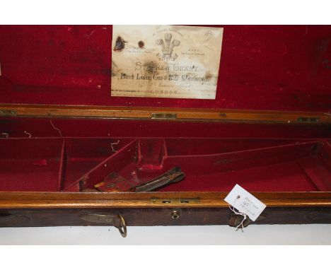 THREE SHOTGUN CASES. The first for a double 30" barrelled shotgun, with makers label inset. Stephen Grant of 67 St James Stre