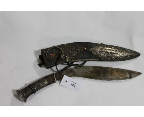 A SILVER PRESENTATION KUKRI etc to LT COL C D ROE DSO-OBE. A silver mounted Kukri with 12.1/2" rust stained blade, with its s