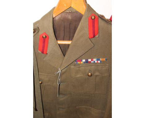 A BRIGADIERS TUNIC &amp; CAP. A Brigadiers tunic with medal ribbons for the, DSO-MC-1914 Trio-1939/45 also France &amp; Germa