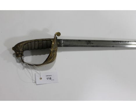 A NAVAL OFFICERS SWORD. A Victorian naval officers sword with pitting in the 33" blade, lacking a scabbard.