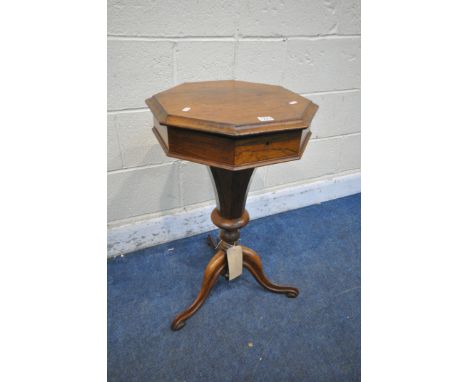 A VICTORIAN ROSEWOOD OCTAGONAL TRUMPET SEWING TABLE, enclosing a baize lined interior, on a tapered support, and tripod legs,