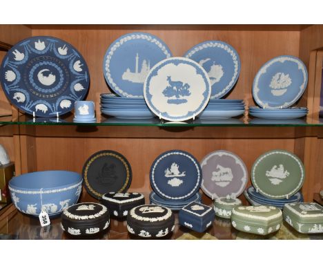 A LARGE COLLECTION OF WEDGWOOD JASPERWARE CHRISTMAS PLATES AND GIFTWARE, comprising fourteen Christmas plates 1969-1980 and 1