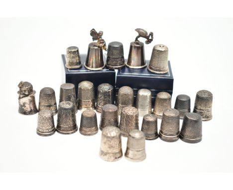 A SELECTION OF SILVER THIMBLES, twenty-six thimbles in total, various designs and patterns, all with a full silver hallmark, 