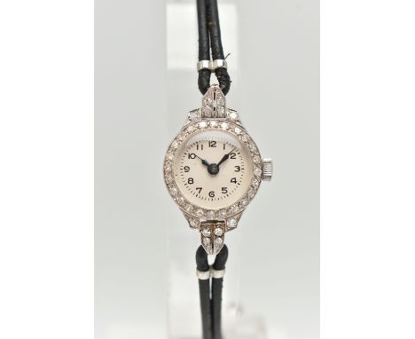 A LADIES DIAMOND SET COCKTAIL WRISTWATCH, manual wind, round silvered dial, Arabic numerals, blue steel hands, single cut dia