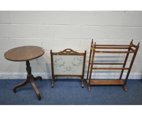 AN EARLY 20TH CENTURY MAHOGANY CIRCULAR TRIPOD TABLE, diameter 54cm x height 74cm, a towel rail and a fire screen, with flora