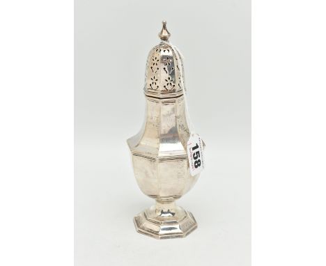 A GEORGE V SILVER SUGAR CASTER, faceted form, pierced cover with pointed finial, on a weighted base, makers mark rubbed, Birm