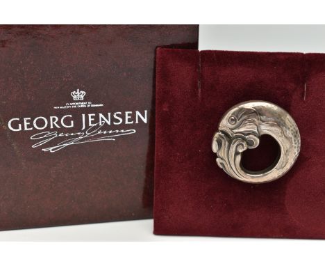 A 'GEORG JENSEN' BROOCH, a circular form brooch depicting a fish, design number 10, approximate width 31mm, signed 'Georg Jen