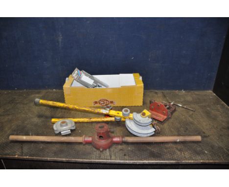 A TRAY CONTAINING PIPE WORK TOOLS including a Record 91 1/2 pipe clamp, a Hilmor pipe bender, a pipe threading bar and dies e