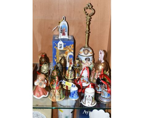 SEVENTEEN CHRISTMAS THEMED BELLS, to include a Capodimonte bell with some restoration to the inside of the bell mouth, a smal