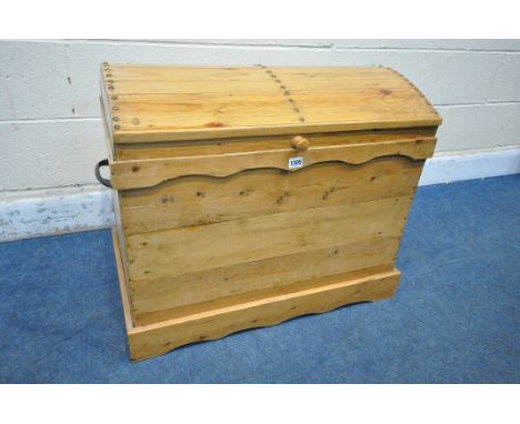 A 20TH CENTURY PINE TRUNK, with a domed top and twin handles, width 80cm x depth 47cm x height 63cm (condition report: one ha