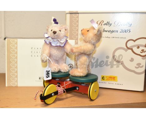 A BOXED LIMITED EDITION STEIFF 'ROLLY DROLLY 2005' PULL ALONG, no 037634, pull along cart with interchangeable teddy bears on