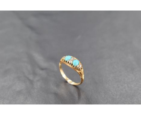 An 18ct gold turquoise and diamond ring, having oval turquoise cabochons interspersed by small diamond brilliants, marked 18c