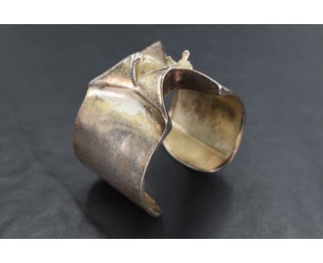 A  silver Lapponia Man from Mercury cuff bangle designed by Bjorn Weckstrom of Finland, hallmarked  1971, approx 68.3g