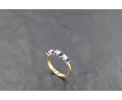 A seven stone sapphire and diamond half eternity ring, total approx 0.45ct on an 18ct gold loop, size L &amp; approx 2.4g