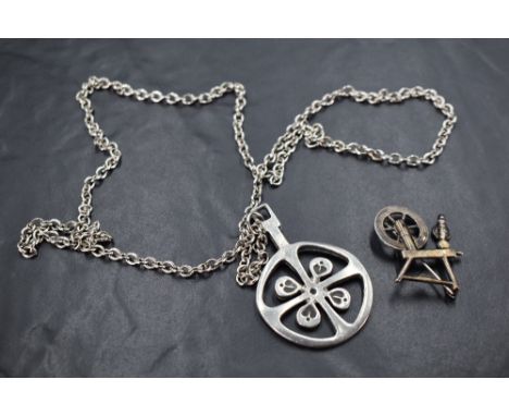 A Swedish pewter pendant of 1960's stylised form bearing mark R TENN SWEDEN  en verso, with original chain, and a white metal