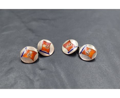 A pair of 925 grade white metal and enamel cuff-links, of circular form and enamelled with a red flag and Crown over GN, 6.6g