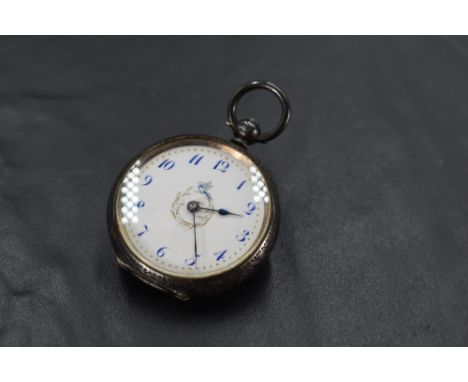 A small Victorian silver key wound poicket watch having blue Arabic numeral dial to white enamel face with central ornitholog