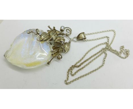 A large silver mounted art glass pendant and chain 