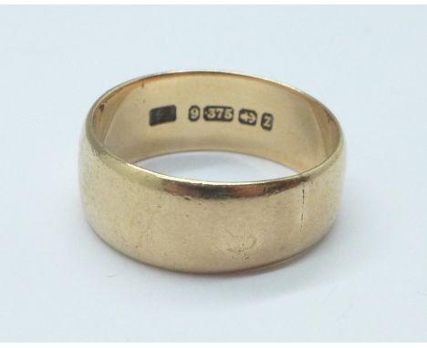 A late Victorian 9ct gold wedding ring, Birmingham 1899, 6.1g, R 