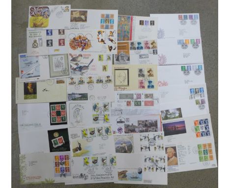 Thirty-one stamp first day covers, including some higher value definitives