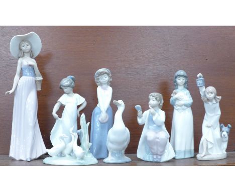 Eight Nao figures 