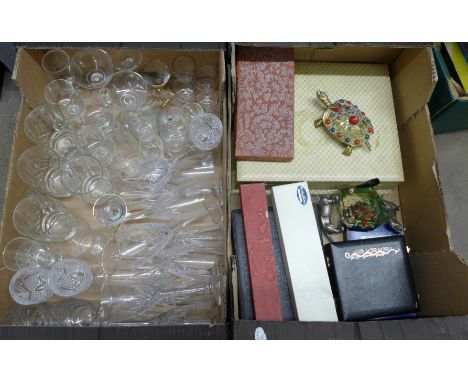 A box of mixed crystal glasses, Babycham glasses, etc. and a box of cased flatware including a silver handled cake slice, two