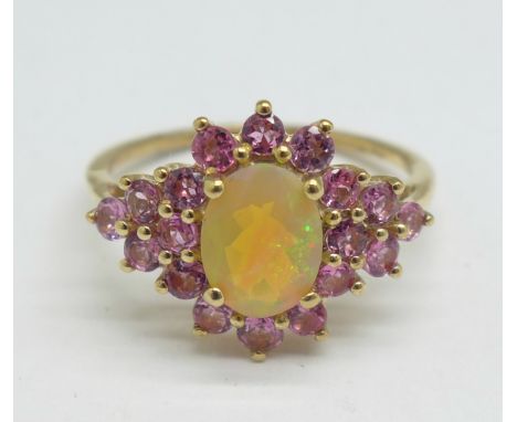 A 9ct gold, tourmaline and welo opal ring, 2.2g, O 