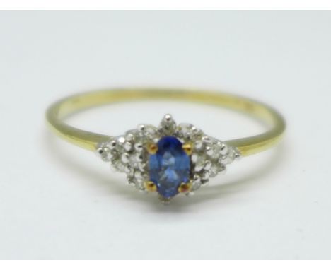 A 9ct gold, diamond and sapphire ring, 1.8g, W 