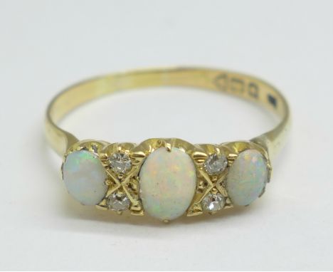 An 18ct gold, opal and diamond ring, c.1910 Chester hallmark, worn date letter, 3.3g, U 