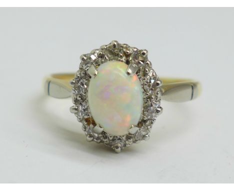 An 18ct gold, platinum set opal and diamond ring, 2.1g, H 