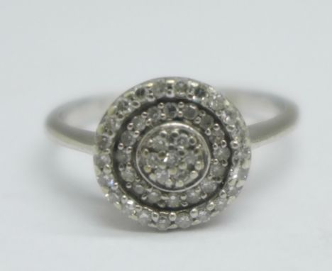 A 9ct white gold and diamond circular Art Deco cluster ring, 1.9g, K 