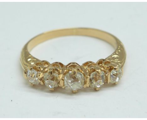 A yellow metal set, five stone diamond ring, (tests as high carat gold), 3g, N 