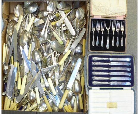 A collection of flatware including a cased set of six silver handled knives 