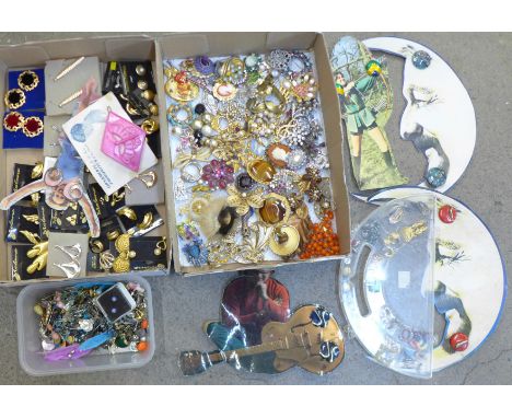 A collection of brooches and clip-on and pierced earrings, some vintage 
