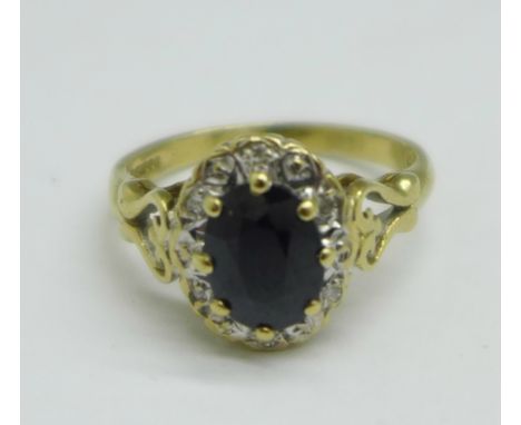 A 9ct gold, sapphire and diamond cluster ring, 3.1g, N 