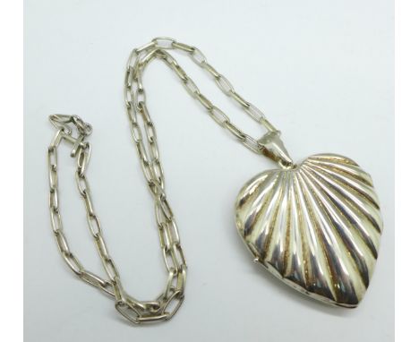 A large 925 silver heart shaped locket and chain, 44mm wide, chain 55cm 