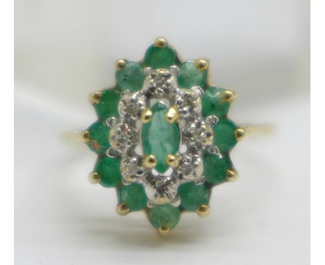 A 9ct gold, emerald and diamond ring, 2.3g, N 