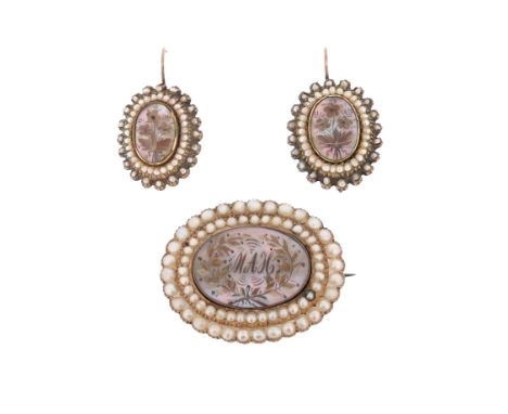 A mid Victorian mother-of-pearl, pearl and gold brooch and earrings, each of oval form, the central mother-of-pearl plaque ap