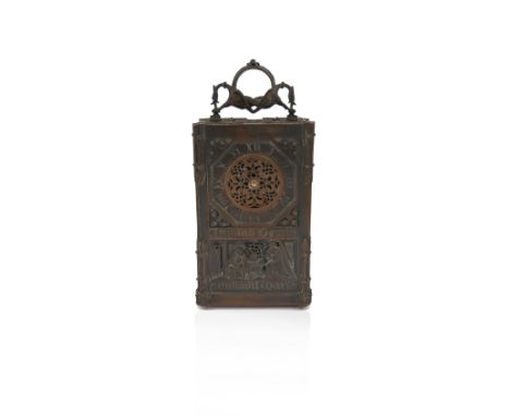 A 19th century copper carriage clock in the Gothic taste, probably by Alexis Falize, the pierced top section with hinged hand