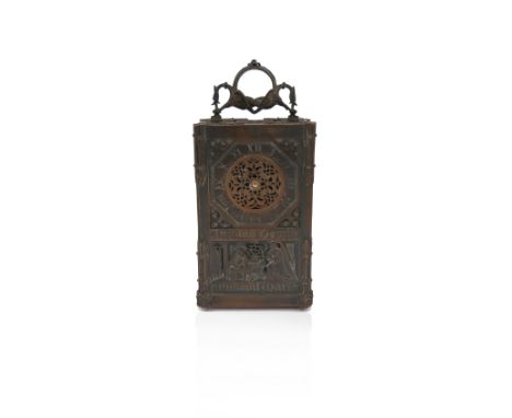 A 19th century copper carriage clock in the Gothic taste, probably by Alexis Falize, the pierced top section with hinged hand