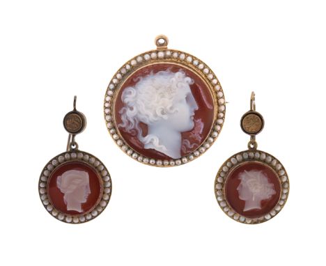 A mid 19th century hardstone cameo and seed pearl -set brooch pendant and pair of earrings, each circular sardonyx cameo depi