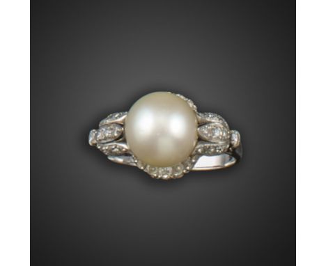 An early 20th century natural pearl and diamond cluster ring, the pearl is set within  borders of graduated circular-cut diam