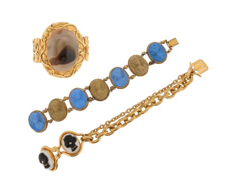 Three items of early-mid 19th century jewellery, including an agate and gilt metal hinged bangle, the central oval agate is c
