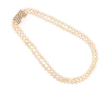 A two-row cultured pearl necklace, with a diamond-set bow clasp in gold, 54cm shortest