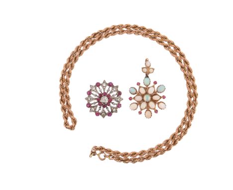 Two gem-set brooches, one of openwork circular design, set with circular-cut rubies and circular-cut diamonds, mounted in sil