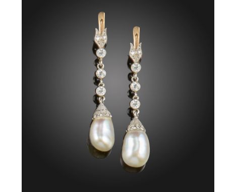 A pair of natural pearl and diamond drop earrings, each pearl suspends from an articulated line of three circular-cut diamond