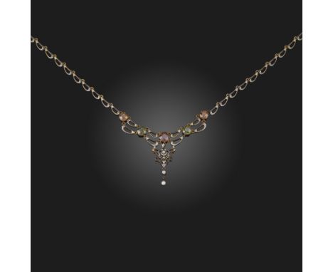 A Renaissance Revival gem-set and enamel gold necklace by Giuliano, c.1895, the openwork gold scroll necklace with black and 