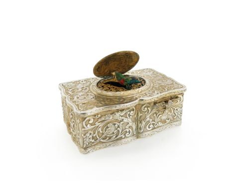 A late 19th century silver singing bird automaton music box, probably German, in the manner of Karl Griesbaum, of shaped rect
